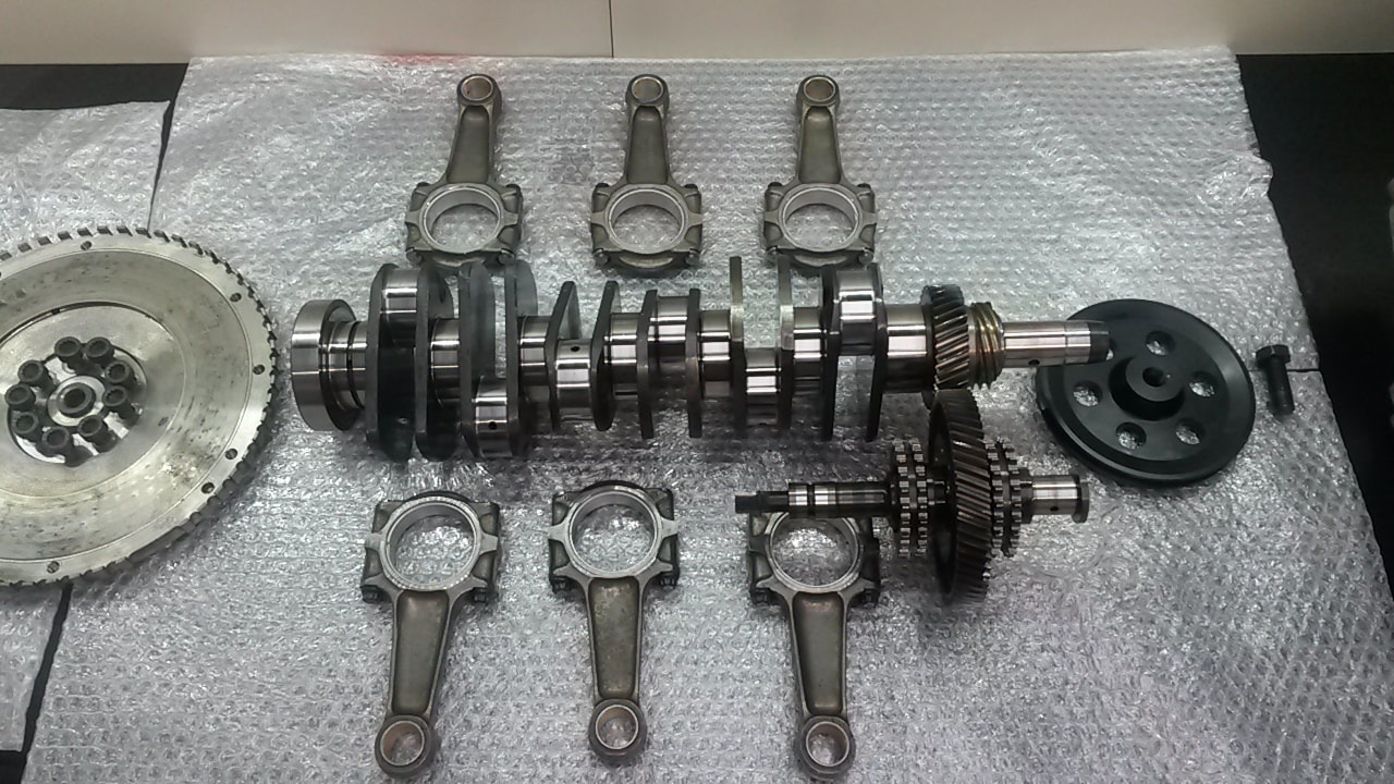 Air-cooled flat-six engine components being rebuilt